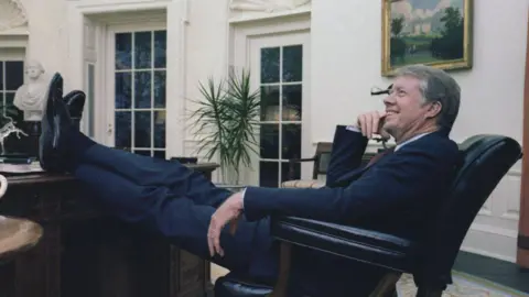 Getty Images Jimmy Carter sitting in the Oval Office 