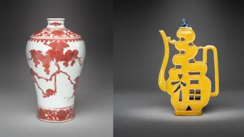 A red and white vase with lotus head motifs. It is next to a yellow-glazed wine pitcher which is designed in a combination of three Chinese characters. 