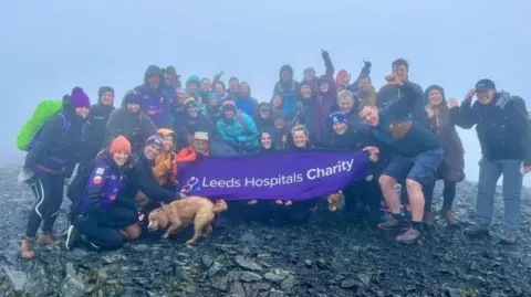 Leeds Hospitals Charity Ian Flatt with volunteer helpers