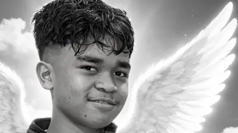 Baltazar L'Quy is a teenage boy. He has short dark hair and the image is black and white.