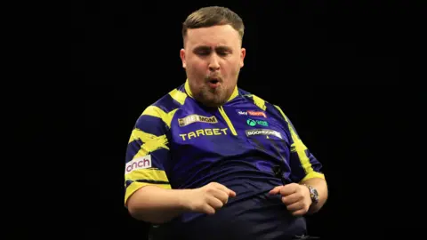 Luke Littler celebrates beating Luke Humphries on night 14 of the Premier League Darts in Leeds