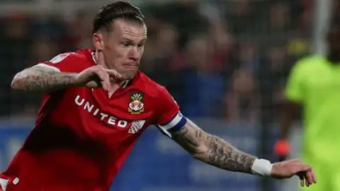James McClean n action for Wrexham
