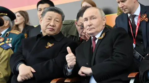President of Russia Vladimir Putin (R) and President of China Xi Jinping (L) attending the Victory Day military parade, marking the 80th anniversary of victory in the Great Patriotic War, on the Red Square in Moscow, Russia, 09 May 2025. 