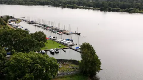 An aerial shot of Wroxham Broad showing a boatyard