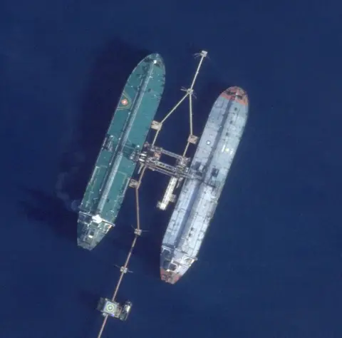 Planet Labs PBC An overhead view of two oil tankers at sea
