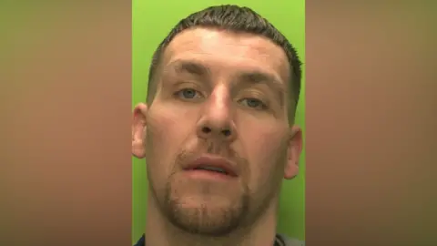 Derbyshire Police mugshot of Nathan Grant, 33, of Collingwood Road, in Long Eaton, in Derbyshire.