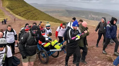 Jon Hobbs Jon Hobbs and helpers climb Penyfan 