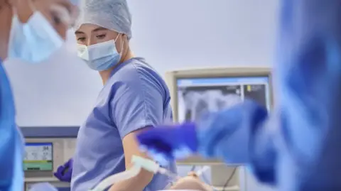 Getty Images Hospital workers