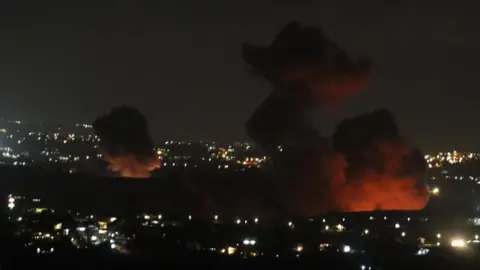 Reuters Smoke billows over southern Lebanon following Israeli strikes, amid ongoing cross-border hostilities between Hezbollah and Israeli forces, as pictured from Marjayoun, near the border with Israel, September 21, 2024