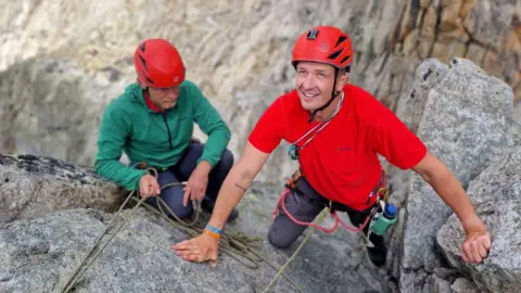 Beetle Campbell Ed Jackson, pictured rock climbing