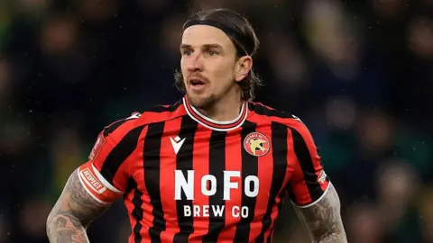 Aiden Flint in action for Walsall