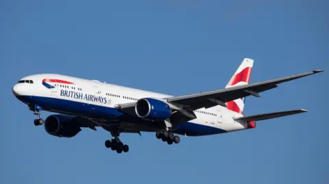 Getty Images British Airways 777 airliner against a blue sky