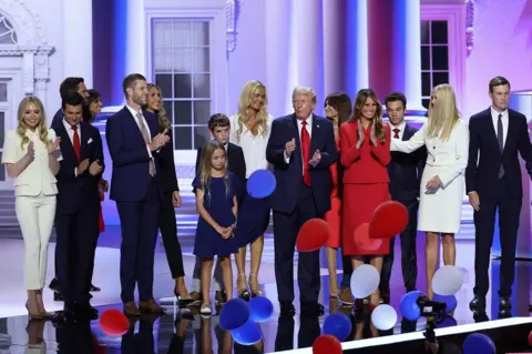 Reuters a line of Trump family members on stage