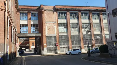 Building with factory windows broken