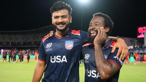 Aaron Jones of USA celebrates with team-mate Monank Patel after winning the ICC Men's T20 Cricket World Cup 2024 match between USA and Canada at Grand Prairie Cricket Stadium