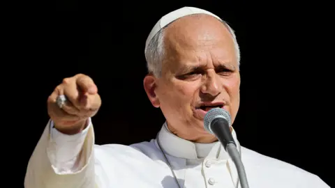 Pope Leo speaks in front of the Pavia Cathedral during his visit to Pavia, Italy, June 20, 2026.