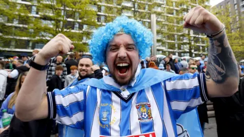 Nigel French/PA Wire Coventry fans at Wembley