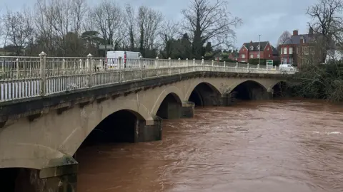 A bridge in Tenbury wells with high water levels running underneath it