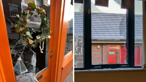 Supplied Broken windows of the Dice Jail (left) and Sanctuary Gaming Centre & Coffee Shop (right) after they were broken into by thieves