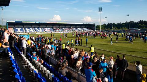 A general view of a full time pitch invasion during a cinch Championship play-off final second leg match between Inverness Caledonian Thistle and Hamilton Academical at the Caledonian Stadium