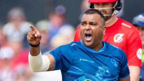 Samit Patel celebrates taking a wicket for Derbyshire