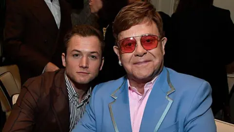 Getty Images Taron Egerton and Elton John attend The BAFTA Los Angeles Tea Party at Four Seasons Hotel Los Angeles at Beverly Hills on January 04, 2020 in Los Angeles, California