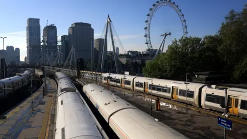  EPA-EFE/REX/Shutterstock Trains at Charing Cross station platforms