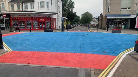 Blue and red on Paignton Road