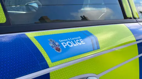 A Devon and Cornwall Police Car.