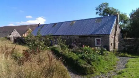 Youth Vision A farm building.