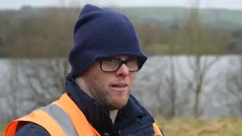 BBC Ed Daly in a high-vis jacket at the reservoir 