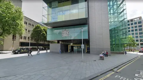 External view of Manchester Civil Justice Centre on Bridge Street, Manchester.