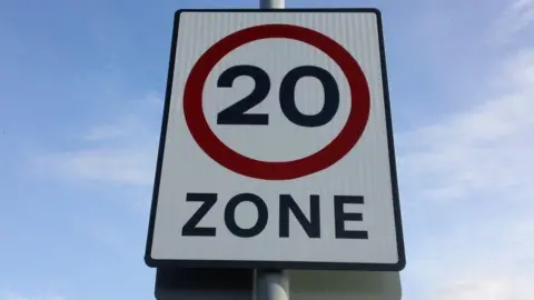 A road sign for a 20mph zone