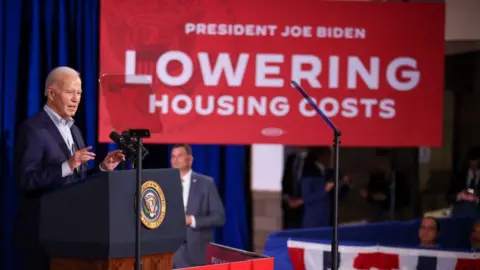 Getty Images Joe Biden has promised to help bring down high housing costs