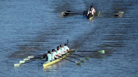 Reuters Rowers take part in the annual Oxford and Cambridge boat race