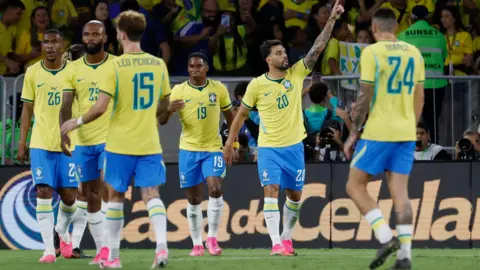 Lucas Paqueta celebrates with his Brazil team-mates