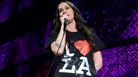 Getty Images Alanis Morissette performs onstage during the FIREAID Benefit Concert for California Fire Relief at The Kia Forum on January 30, 2025 in Inglewood, California