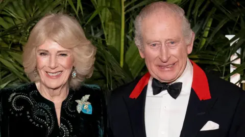 King Charles and Queen Camilla, head and shoulders, at the premiere of Finding Harmony at Windsor Castle