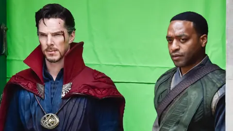 Actors Benedict Cumberbatch and Chiwetel Ejiofor in costume filming Doctor Strange