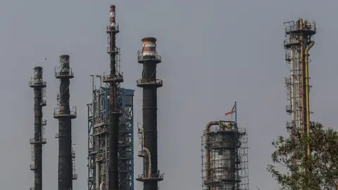 Bloomberg via Getty Images An oil refinery operated by Hindustan Petroleum Corp., in Mumbai, India, on Friday, April 4, 2025. Indian refiners have rushed back to the market to seek crude supply after President Donald Trump's threat of more penalties against Russia raised concerns over potential disruptions to oil flows.