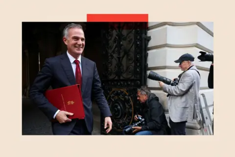 Reuters British Secretary of State for Business and Trade Peter Kyle walks outside Downing Street