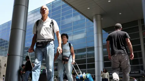 Travellers at Ben Gurion International airport