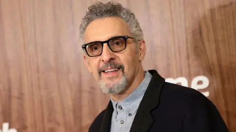 Getty Images John Turturro attends Amazon Prime's "Mr. & Mrs. Smith" New York Premiere at The Weylin on January 31, 2024 in Brooklyn, New York. 