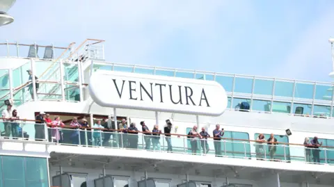 Getty Images Passengers standing on top deck of Ventura