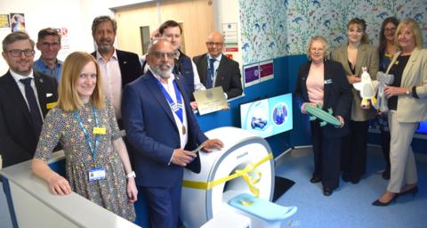Dartford Lions Club members stand with Darent Valley Hospital staff by the new kitten scanner
