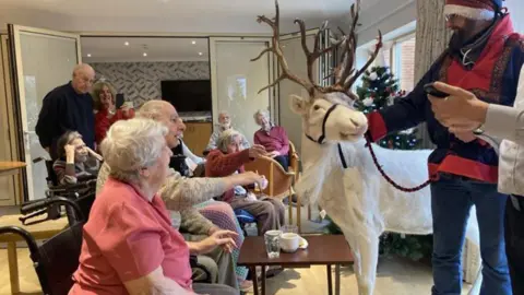 Annabel Dry/BBC Reindeer visiting Rusthall Lodge care home, Tunbridge Wells