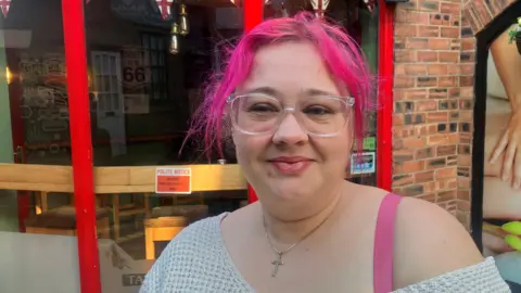 Photograph of Nicola Hamill from the Tap and Barrell in Wigan town centre. The image of the 41 year-old is taken outside of the bar.