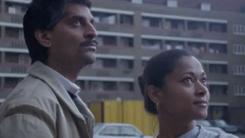 The Bangladeshi couple played by Aftab Sachak and Alpana Sengupta
