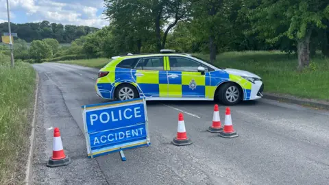 A police road block on Cotgrave Road