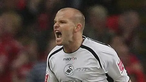 Andy Robinson celebrating after scoring for Swansea City against Barnsley in the League One Play Off final in 2006